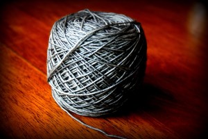 It struck me as funny at first to think of buying a skein of wool in a souvenir shop. Then I started thinking about my favorite mementoes from trips, vacations and events we have attended in the past.