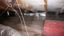 Attic insulation and radiant barrier foil reduce utility bills